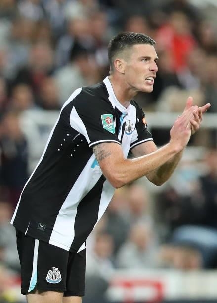 Ciaran Clark of Newcastle United reacts during the Carabao Cup Second Round match between Newcastle United and Burnley at St. James Park on August...