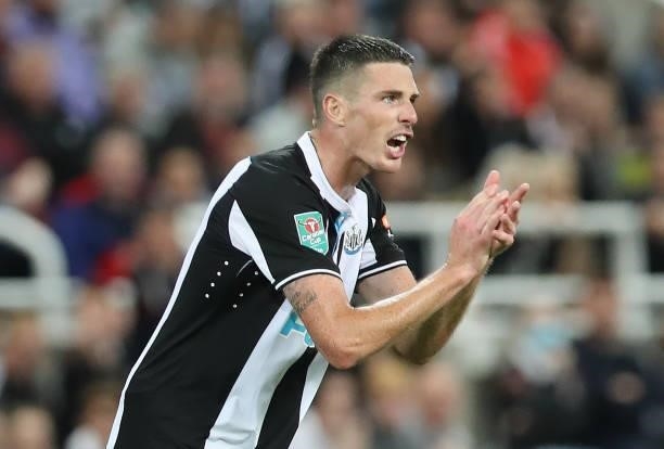 Ciaran Clark of Newcastle United reacts during the Carabao Cup Second Round match between Newcastle United and Burnley at St. James Park on August...