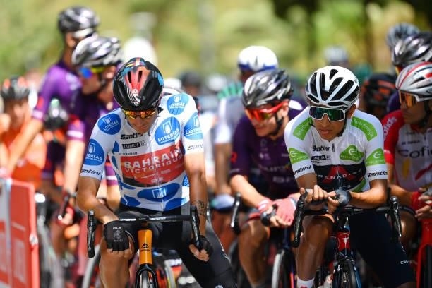 Damiano Caruso of Italy and Team Bahrain Victorious polka dot mountain jersey and Egan Arley Bernal Gomez of Colombia and Team INEOS Grenadiers white...