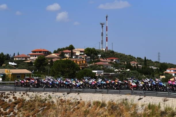General view of the peloton passing through Jaén city landscape during the 76th Tour of Spain 2021, Stage 12 a 175 km stage from Jaén to Córdoba /...