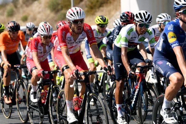 Jesús Herrada Lopez of Spain and Team Cofidis and Egan Arley Bernal Gomez of Colombia and Team INEOS Grenadiers white best young jersey compete...
