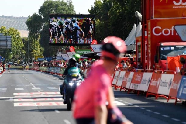 Screen at the finish line offers a replay of the sprint during the 76th Tour of Spain 2021, Stage 12 a 175 km stage from Jaén to Córdoba / @lavuelta...