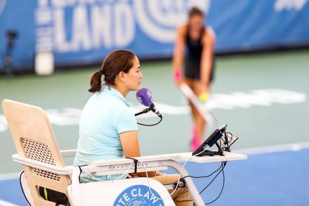The chair umpire waits for Daria Kasatkina of Russia to serve in the second set of Kasatkina"u2019s quarterfinal match against Magda Linette of...
