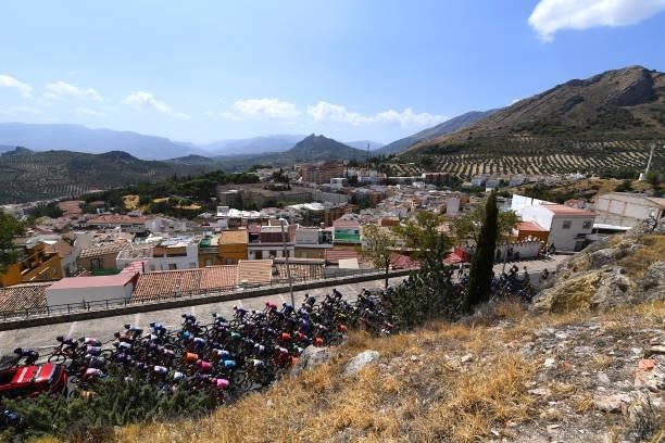 General view of the peloton passing through Jaén city landscape during the 76th Tour of Spain 2021, Stage 12 a 175 km stage from Jaén to Córdoba /...