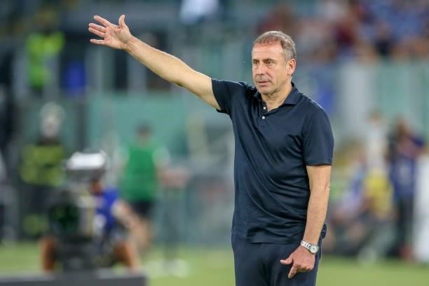 Coach Abdullah Asan of Trabzonspor gives instructions to his players during the UEFA Conference League Play-Offs Leg Two match between AS Roma and...