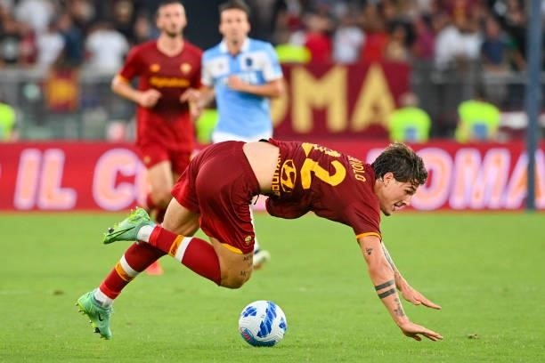 Nicolò Zaniolo of AS Roma falls down during the UEFA Conference League Play-Offs Leg Two match between AS Roma and Trabzonspor at Olimpico Stadium on...