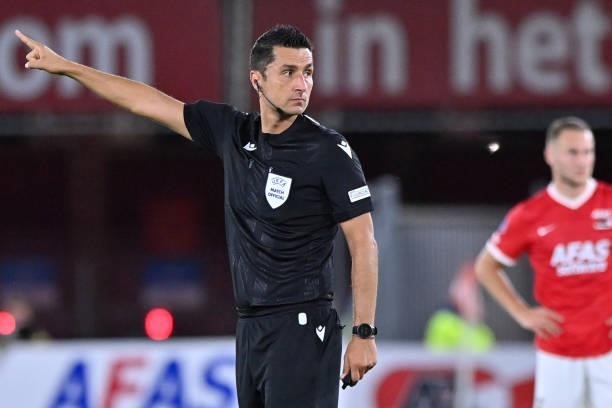 Referee Tiago Martins gestures during the UEFA Europa League play off match between AZ and Celtic at AFAS Stadion on August 26, 2021 in Alkmaar,...