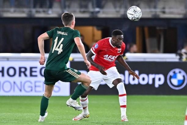 David Turnbull of Celtic, Bruno Martins Indi of AZ during the UEFA Europa League play off match between AZ and Celtic at AFAS Stadion on August 26,...