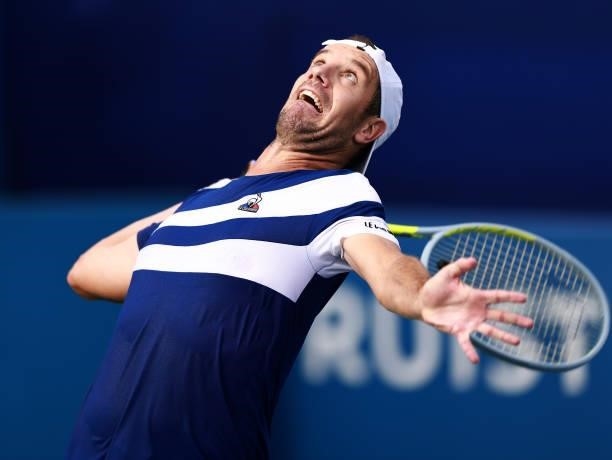 Richard Gasquet of France serves to Emil Ruusuvuori of Finland in the quarterfinals of the Winston-Salem Open at Wake Forest Tennis Complex on August...
