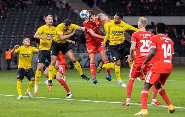 Robin Knoche of 1.FC Union Berlin jumps for a header during the UEFA Conference League Play-Offs Leg Two match between 1. FC Union Berlin and Kuopion...