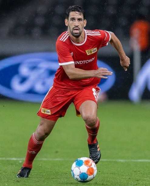 Rani Khedira of 1.FC Union Berlin runs with the ball during the UEFA Conference League Play-Offs Leg Two match between 1. FC Union Berlin and Kuopion...