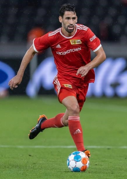 Rani Khedira of 1.FC Union Berlin runs with the ball during the UEFA Conference League Play-Offs Leg Two match between 1. FC Union Berlin and Kuopion...