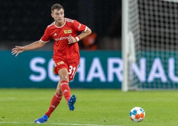 Robin Knoche of 1.FC Union Berlin runs with the ball during the UEFA Conference League Play-Offs Leg Two match between 1. FC Union Berlin and Kuopion...
