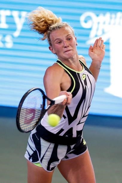 Katerina Siniakova of the Czech Republic returns a serve during the second set of her quarterfinal match against Anett Kontaveit of Estonia on day 5...