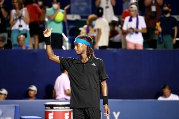 Mikael Ymer of Sweden salutes the crowd after his win against Frances Tiafoe in the quarterfinals of the Winston-Salem Open at Wake Forest Tennis...
