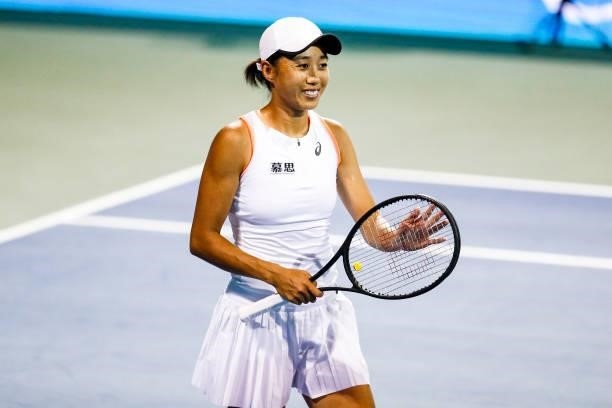 Shuai Zhang of China celebrates during the first set of her quarterfinal doubles match against Christina McHale of USA and Sania Mirza of Indiaon day...