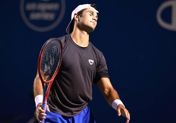 Marcos Giron reacts during his match against Carlos Alcaraz of Spain in the quarterfinals of the Winston-Salem Open at Wake Forest Tennis Complex on...