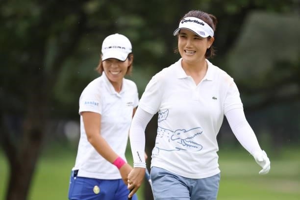 Mi-Jeong Jeon of South Korea smiles after making her chip in birdie on the 18th hole during the second round of the Nitori Ladies at Otaru Country...