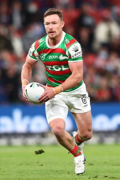 Damien Cook of the Rabbitohs runs the ball during the round 24 NRL match between the Sydney Roosters and the South Sydney Rabbitohs at Suncorp...