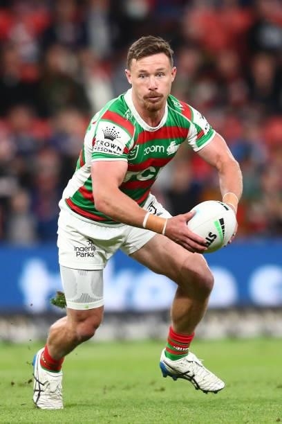 Damien Cook of the Rabbitohs runs the ball during the round 24 NRL match between the Sydney Roosters and the South Sydney Rabbitohs at Suncorp...