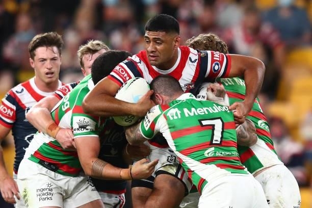 Daniel Tupou of the Roosters is tackled during the round 24 NRL match between the Sydney Roosters and the South Sydney Rabbitohs at Suncorp Stadium...