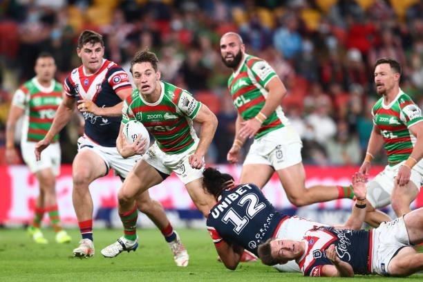 Cameron Murray of the Rabbitohs is tackled during the round 24 NRL match between the Sydney Roosters and the South Sydney Rabbitohs at Suncorp...