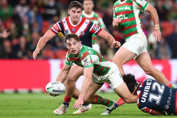 Cameron Murray of the Rabbitohs looks to offload the ball during the round 24 NRL match between the Sydney Roosters and the South Sydney Rabbitohs at...