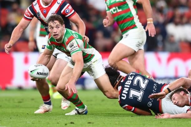Cameron Murray of the Rabbitohs looks to offload the ball during the round 24 NRL match between the Sydney Roosters and the South Sydney Rabbitohs at...