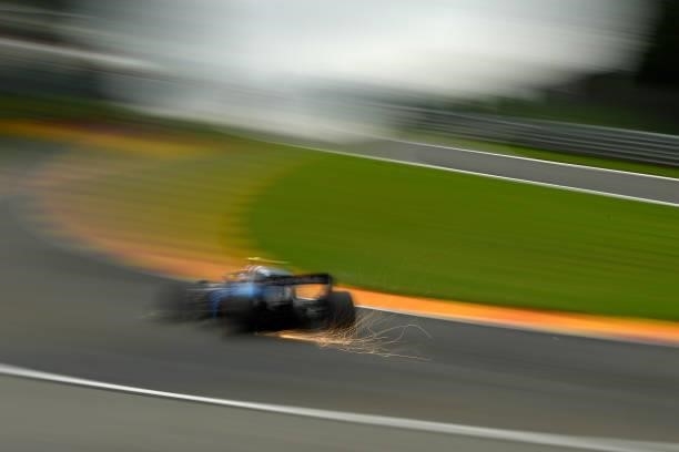 Sparks fly behind Nicholas Latifi of Canada driving the Williams Racing FW43B Mercedes during practice ahead of the F1 Grand Prix of Belgium at...