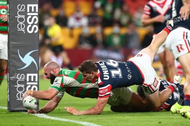 Mark Nicholls of the Rabbitohs scores a try during the round 24 NRL match between the Sydney Roosters and the South Sydney Rabbitohs at Suncorp...