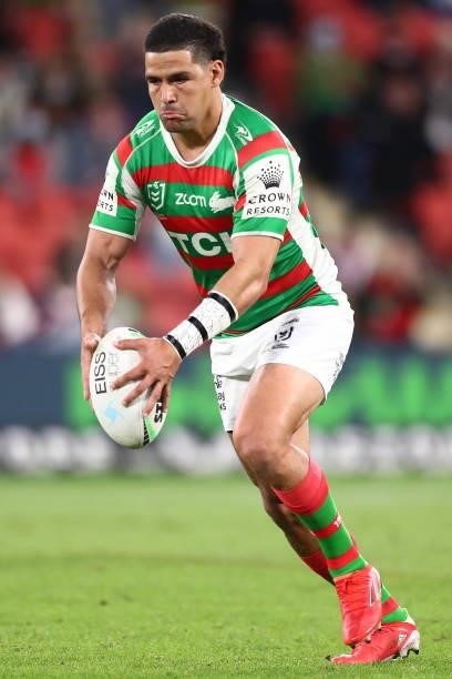Cody Walker of the Rabbitohs kicks the ball during the round 24 NRL match between the Sydney Roosters and the South Sydney Rabbitohs at Suncorp...