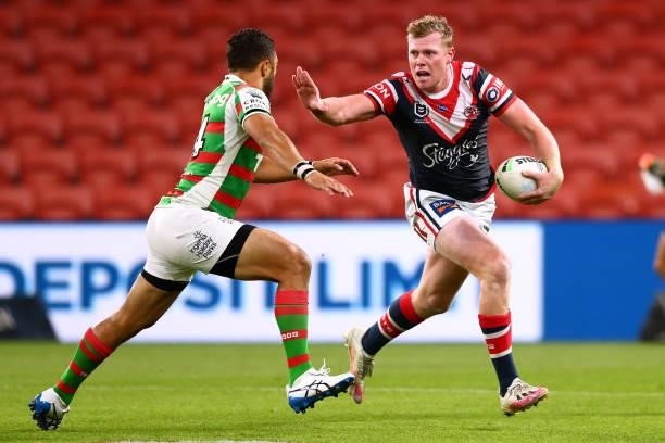 Drew Hutchison of the Roosters makes a break during the round 24 NRL match between the Sydney Roosters and the South Sydney Rabbitohs at Suncorp...