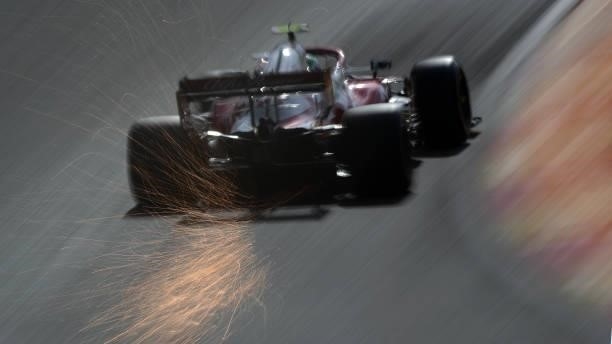 Sparks fly behind Antonio Giovinazzi of Italy driving the Alfa Romeo Racing C41 Ferrari during practice ahead of the F1 Grand Prix of Belgium at...