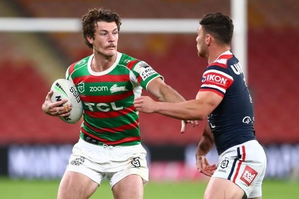 Campbell Graham is tackled during the round 24 NRL match between the Sydney Roosters and the South Sydney Rabbitohs at Suncorp Stadium on August 27...
