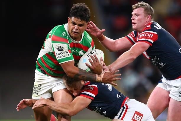 Latrell Mitchell of the Rabbitohs is tackled during the round 24 NRL match between the Sydney Roosters and the South Sydney Rabbitohs at Suncorp...
