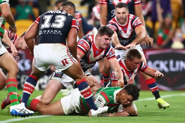 Latrell Mitchell of the Rabbitohs scores a try during the round 24 NRL match between the Sydney Roosters and the South Sydney Rabbitohs at Suncorp...