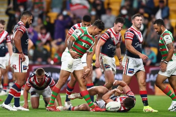 Latrell Mitchell of the Rabbitohs reacts after scoring a try during the round 24 NRL match between the Sydney Roosters and the South Sydney Rabbitohs...