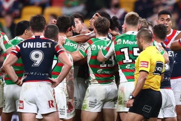 Players scuffle after a Rabbitohs try during the round 24 NRL match between the Sydney Roosters and the South Sydney Rabbitohs at Suncorp Stadium on...