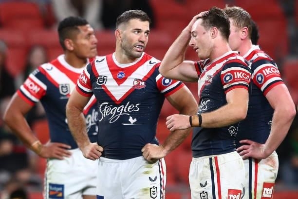 James Tedesco of the Roosters looks on with team mates after a Rabbitohs try during the round 24 NRL match between the Sydney Roosters and the South...