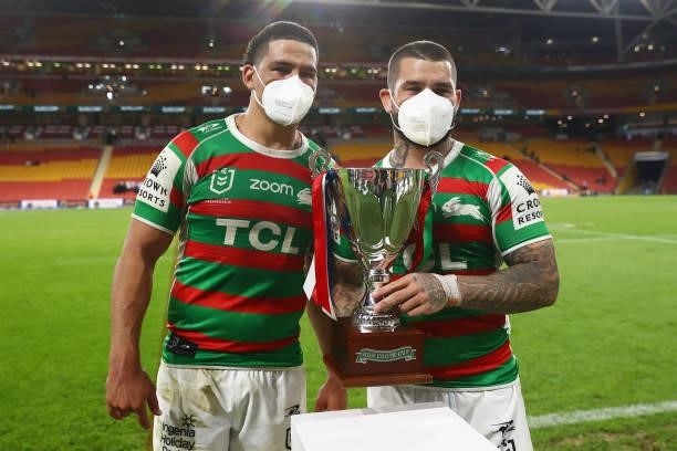 Cody Walker of the Rabbitohs and Adam Reynolds of the Rabbitohs poses with the Ron Coote Cup after the round 24 NRL match between the Sydney Roosters...