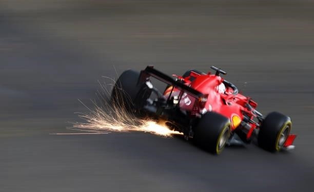 Sparks fly behind Charles Leclerc of Monaco driving the Scuderia Ferrari SF21 during practice ahead of the F1 Grand Prix of Belgium at Circuit de...