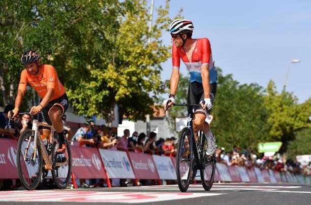 Juan Jose Lobato Del Valle of Spain and Team Euskaltel - Euskadi and Kevin Geniets of Luxembourg and Team Groupama - FDJ cross the finishing line...