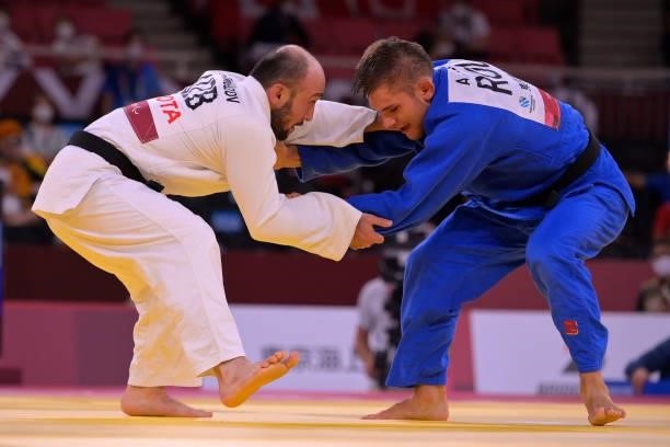 Alex Bologa of Team Romania and Sherzod Namozov of Team Uzbekistan compete in the Men's -60kg Judo Bronze Medal Contest on day 3 of the Tokyo 2020...