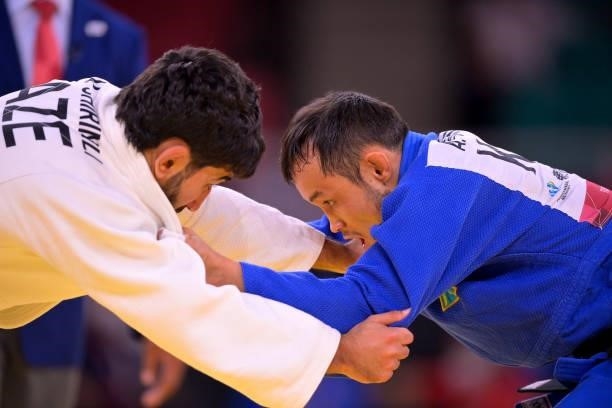 Vugar Shirinli of team Azerbaijan and Anuar Sariyev of team Kazakhstan compete in the Men's -60kg Judo Gold Medal Contest on day 3 of the Tokyo 2020...