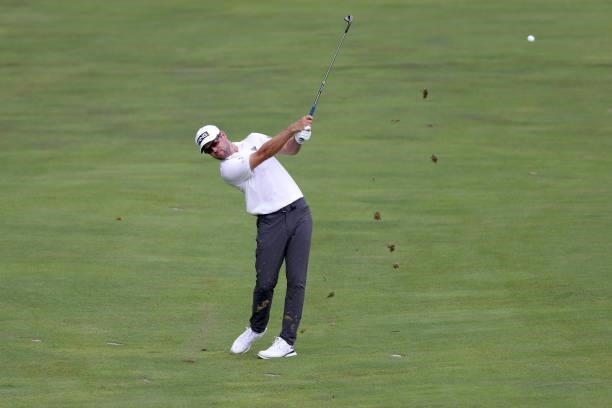Corey Conners of Canada plays a shot on the seventh hole during the second round of the BMW Championship at Caves Valley Golf Club on August 27, 2021...