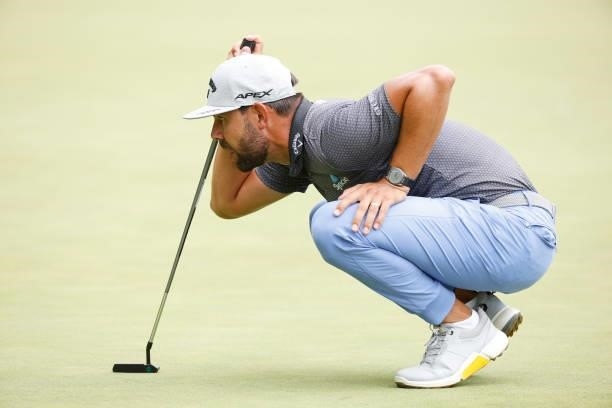 Erik van Rooyen of South Africa lines up a putt on the eighth green during the second round of the BMW Championship at Caves Valley Golf Club on...