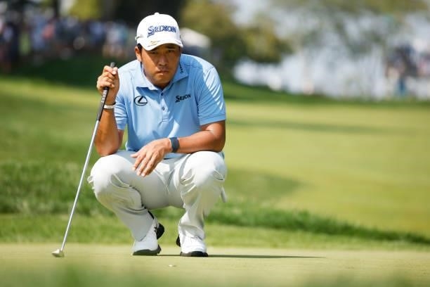 Hideki Matsuyama of Japan lines up a putt on the first green during the second round of the BMW Championship at Caves Valley Golf Club on August 27,...