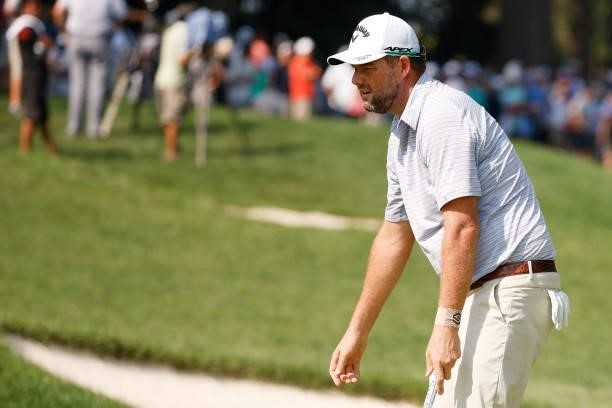 Marc Leishman of Australia reacts on the first green during the second round of the BMW Championship at Caves Valley Golf Club on August 27, 2021 in...