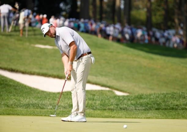 Marc Leishman of Australia putts on the first green during the second round of the BMW Championship at Caves Valley Golf Club on August 27, 2021 in...