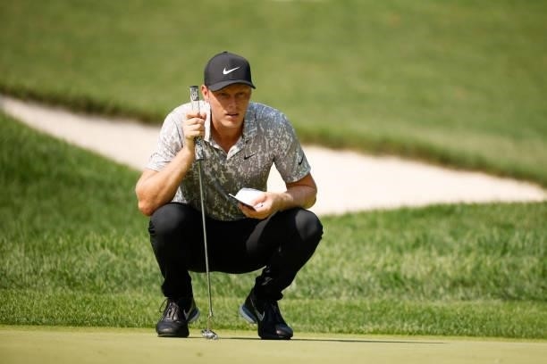Cameron Davis of Australia lines up a putt on the first green during the second round of the BMW Championship at Caves Valley Golf Club on August 27,...